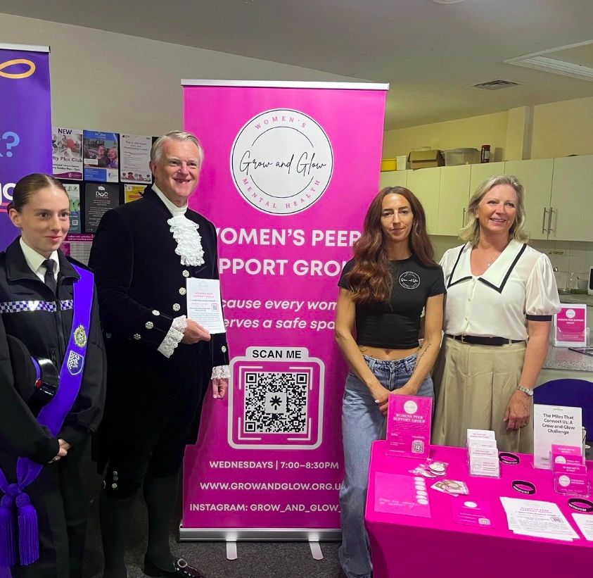 Grow and Glow representing women's peer support at a community event